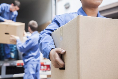Removal van with reusable moving boxes and recycling materials in Edgware