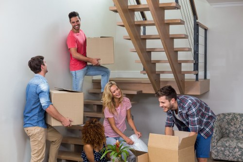 Removal team handling a same day move in Edgware with boxes and furniture