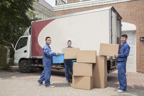 Removal team loading moving boxes for a home move in Edgware