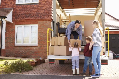 Office removals planning in Edgware with boxes and workspace equipment