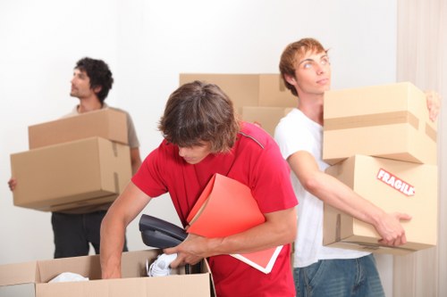 Movers loading household items for an Edgware relocation