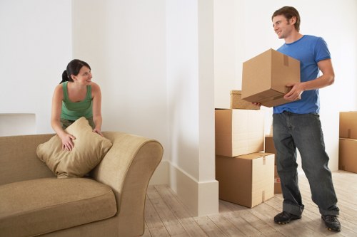 Furniture being carried from a flat in Edgware